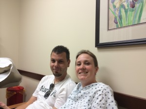 Mike and I waiting for the CT results. We look sooo excited. My dad took the photo.